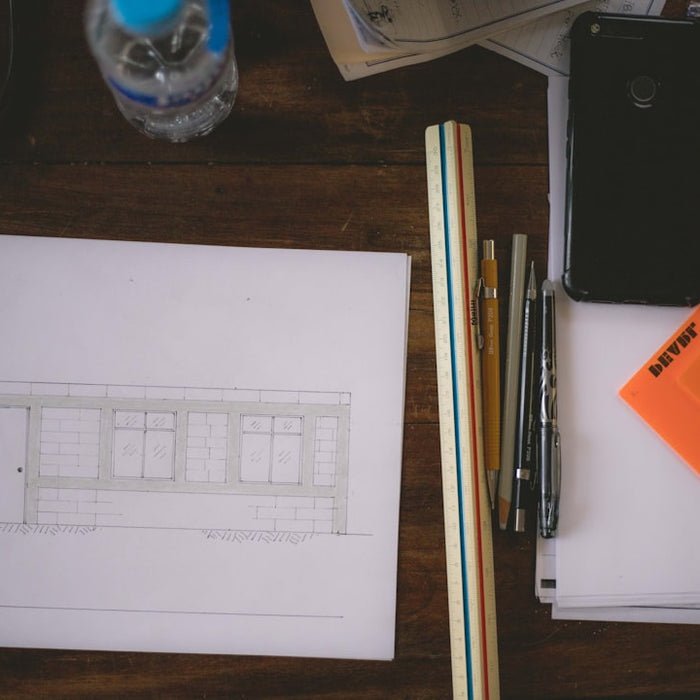 white printer paper near pen