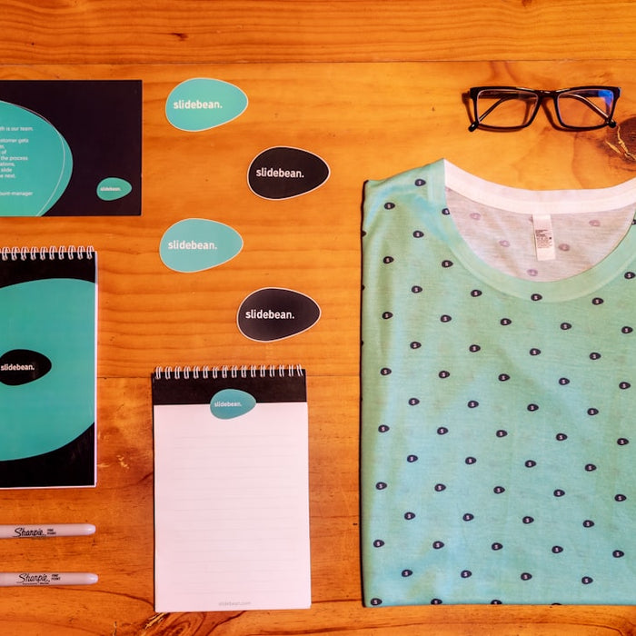 black framed eyeglasses beside white paper