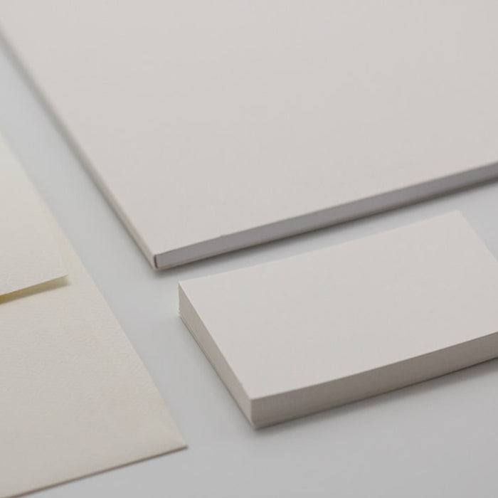 white printer paper on white surface