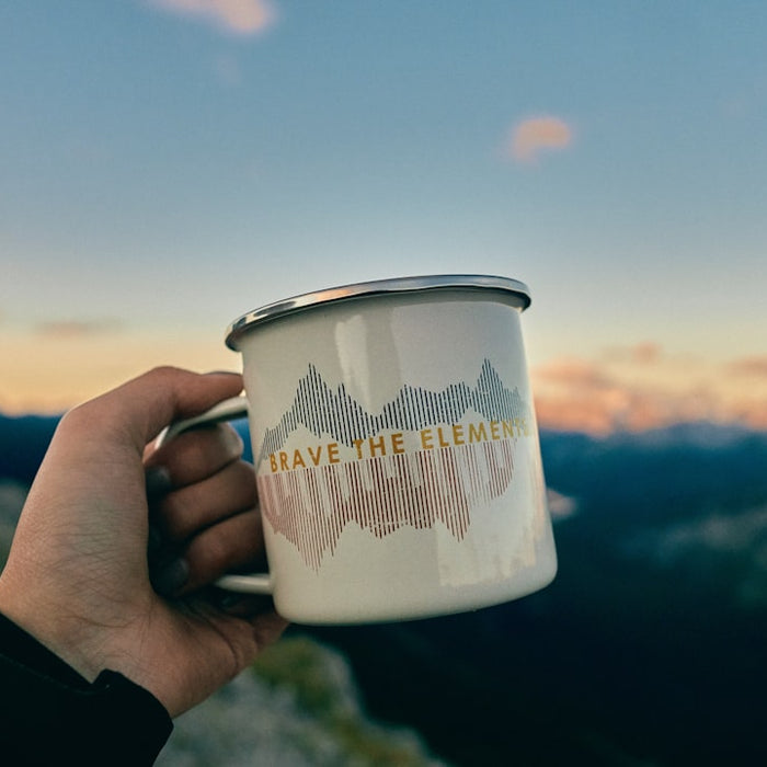 white and blue ceramic mug