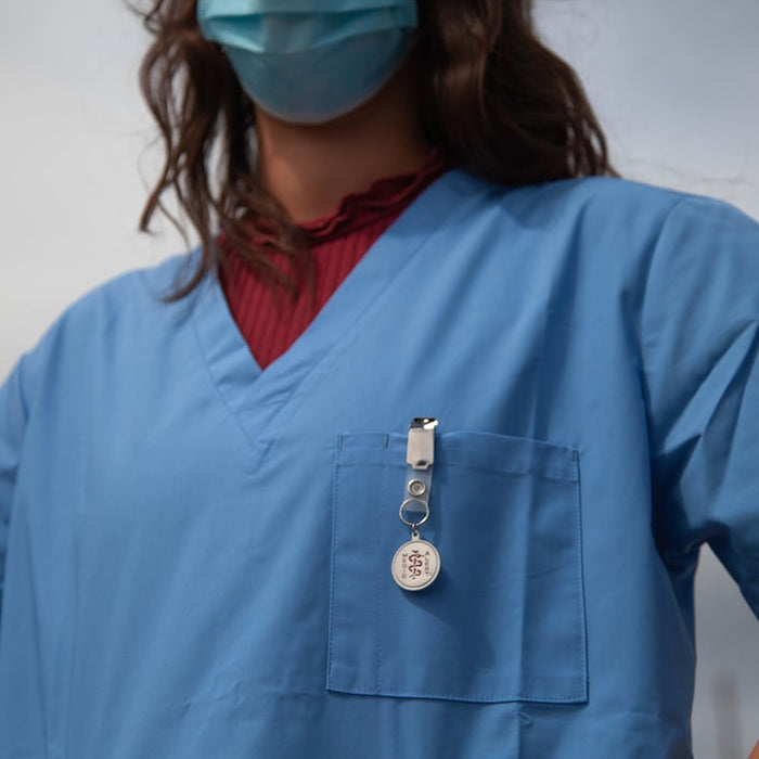 woman in red shirt wearing blue goggles