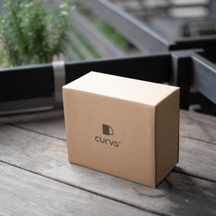 brown cardboard box on brown wooden table