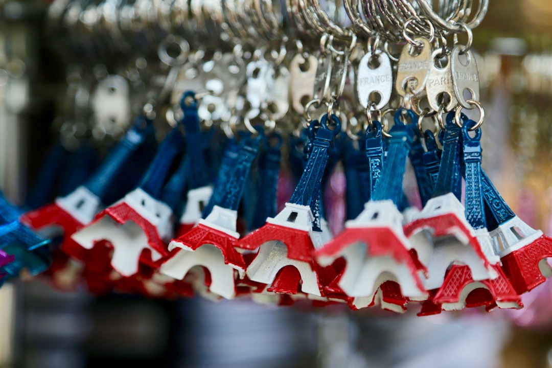 a bunch of keys hanging from a rack
