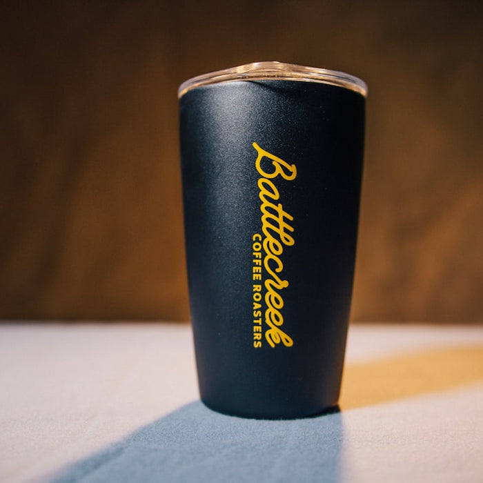 a close up of a cup on a table