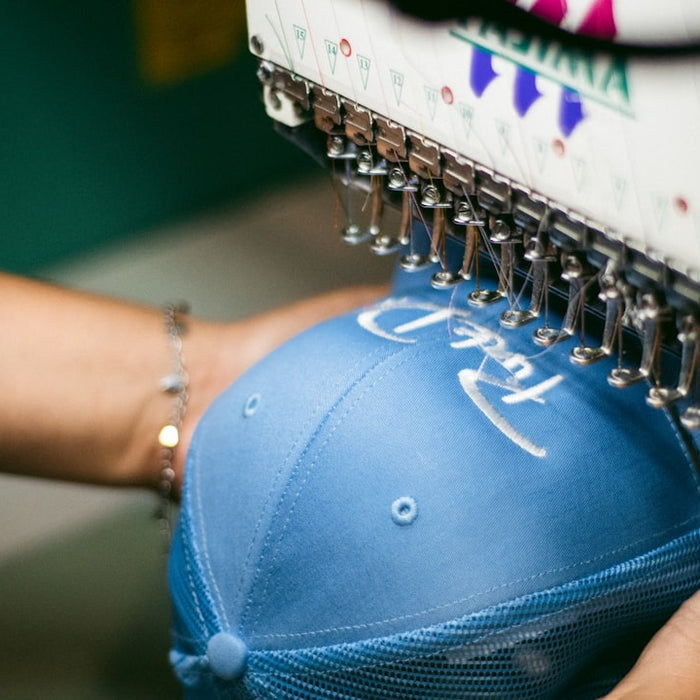 a person holding a blue object