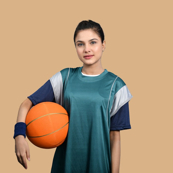 a man holding a basketball