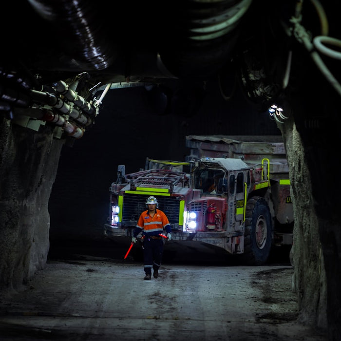 a person standing in a tunnel