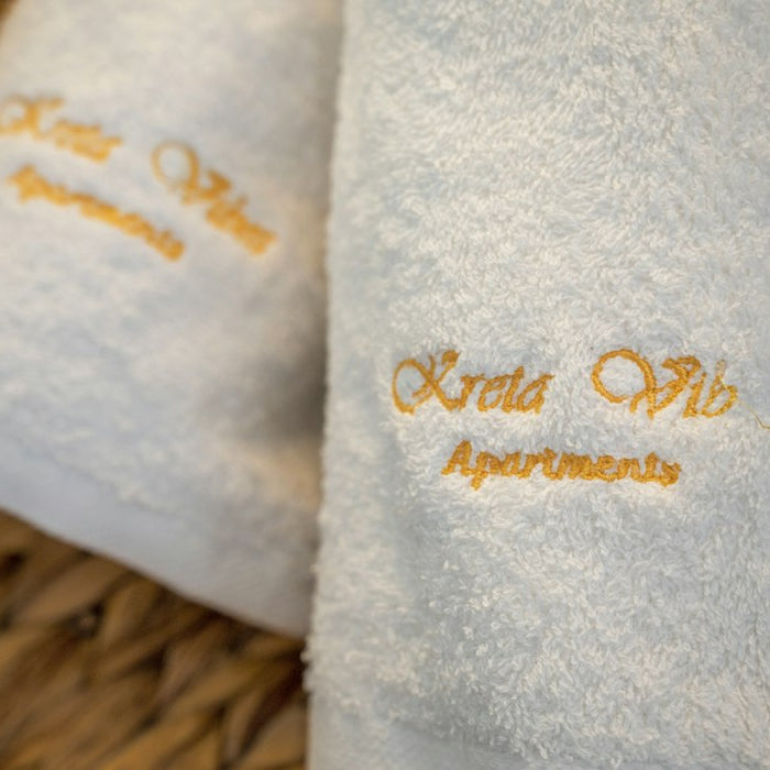 a close up of towels on a wicker basket