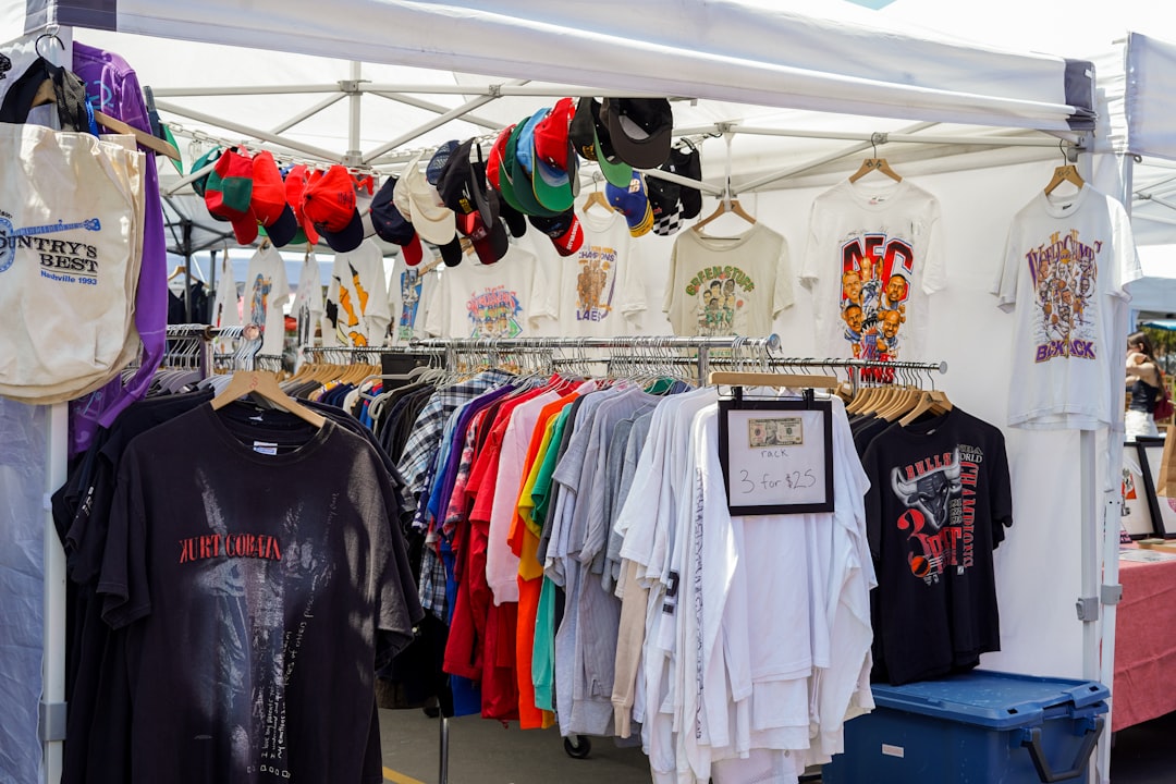 a tent that has a bunch of shirts on it