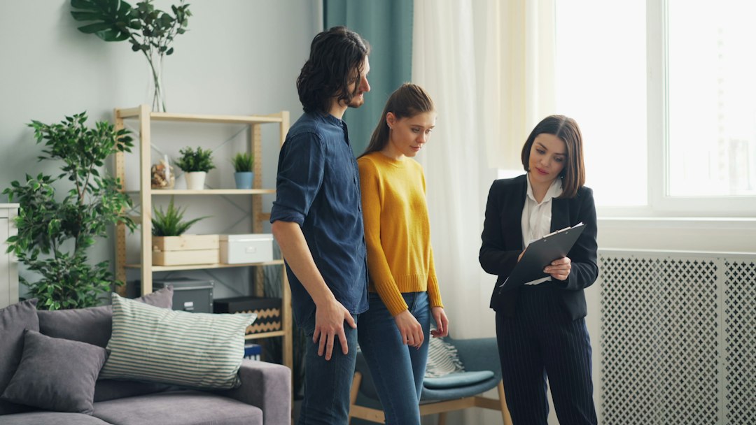 a man and a woman standing in a living room