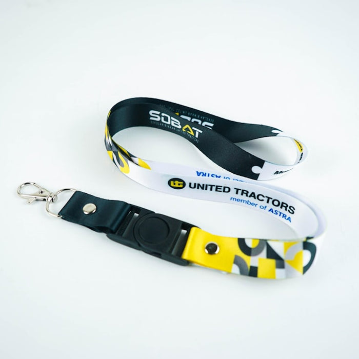Two lanyards with united tractors logo on white background
