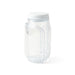 Go Salad Jar - A clear plastic salad jar with a white lid and a unique curved design. It features a logo on the side.