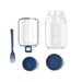 Go Salad Jar - A transparent salad jar with a blue lid and fork, featuring a compartment for dressing.