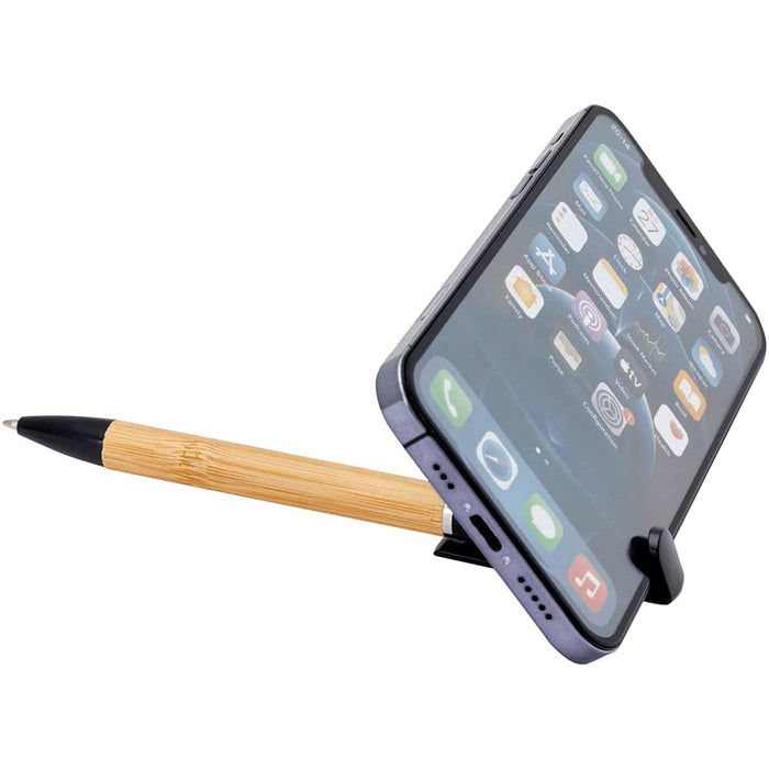 Travel Pack - A bamboo pen holds a smartphone upright on a black stand, showcasing a clear phone screen.