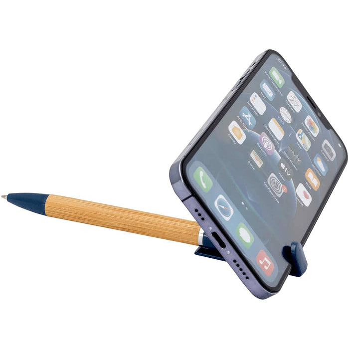 Delfina Phone Holder Pen - A blue pen with a bamboo body holding a smartphone upright, showcasing its sleek design and functionality.