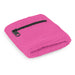 Wrist Sweat Band with Pocket - A pink wrist sweat band with a zippered pocket, made from textured material. It features a small logo.