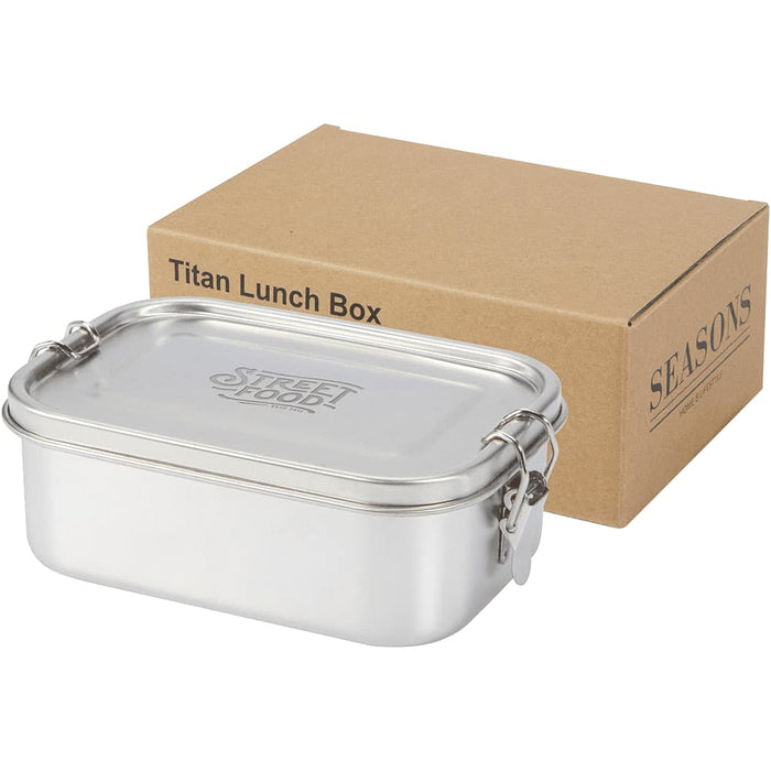 Seasons Titan Recycled Stainless Steel Lunch Box - A stainless steel lunch box in silver, accompanied by a cardboard box with a logo.