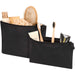 Swift GRS Recycled Toiletry Bag Set - A set of two black toiletry bags filled with various grooming products, including a hairbrush, lotion, and toothbrushes.