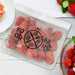Julienne Reusable Pouch - A transparent reusable pouch filled with fresh strawberries, featuring a circular logo design.