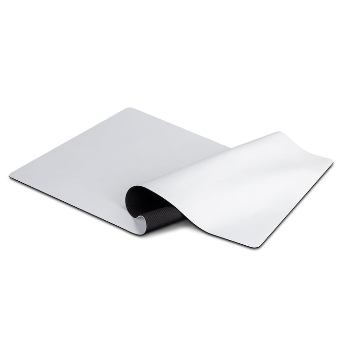 Desk Mat - A white desk mat featuring a smooth surface, curved edges, and a textured underside for stability.
