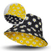 Sonny Custom Reversible Bucket Hat - A reversible bucket hat featuring a yellow floral pattern on one side and a black floral pattern on the other.