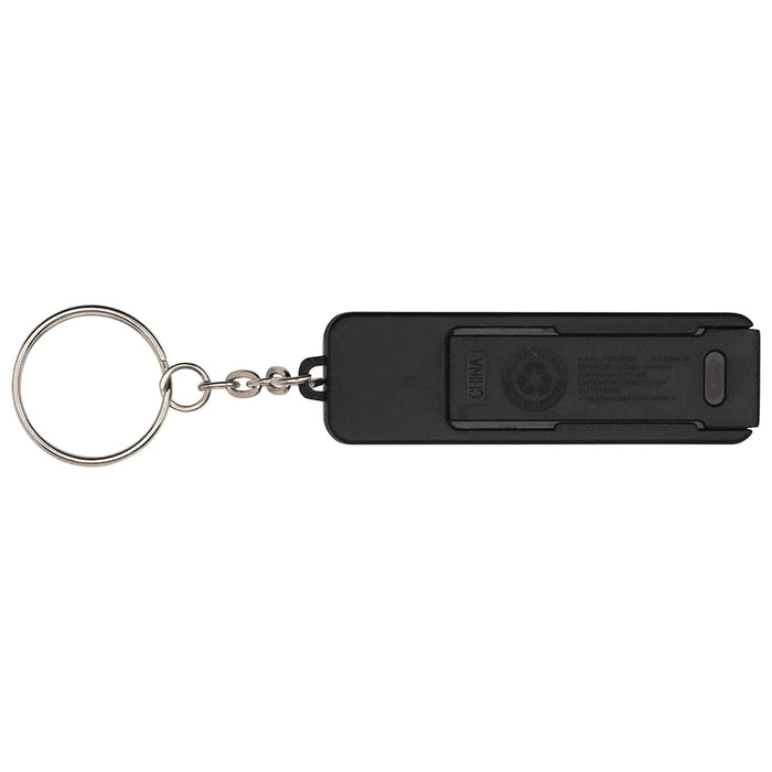 Aggia Recycled Plastic Phone Stand w/ Fidget Toy - A black keychain with a rectangular body and a circular attachment ring. It features a logo on one side.