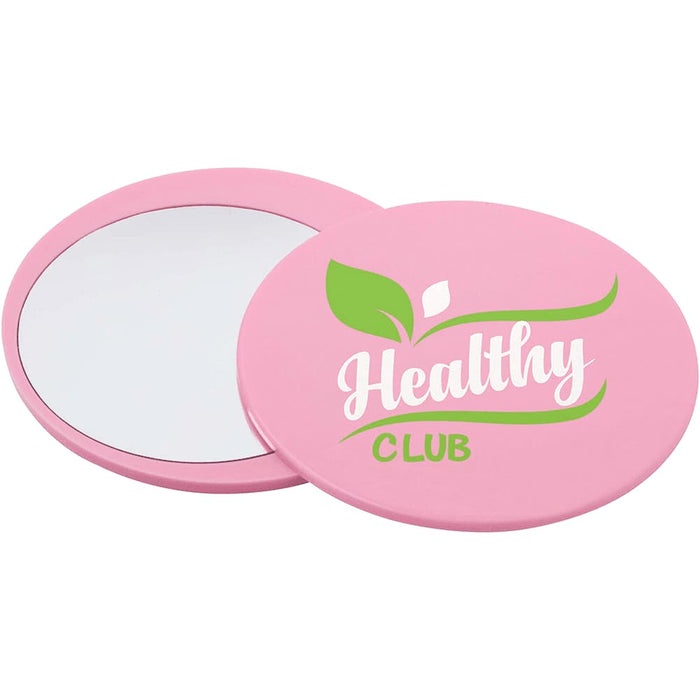 Glider Slider Makeup Mirror - A pink circular makeup mirror with a glossy finish, featuring a logo and a reflective surface.
