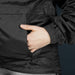 Swiss Peak Urban Windbreaker - A black windbreaker featuring an elasticated cuff and a hand in the side pocket. Branding is visible on the jacket.