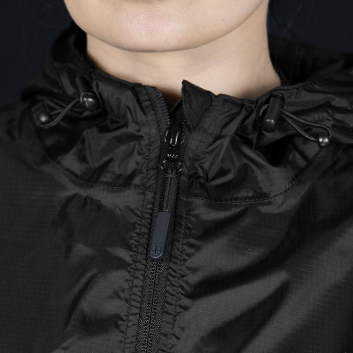 Swiss Peak Urban Windbreaker - A black windbreaker jacket featuring a zip front and adjustable drawcord hood, with a logo.