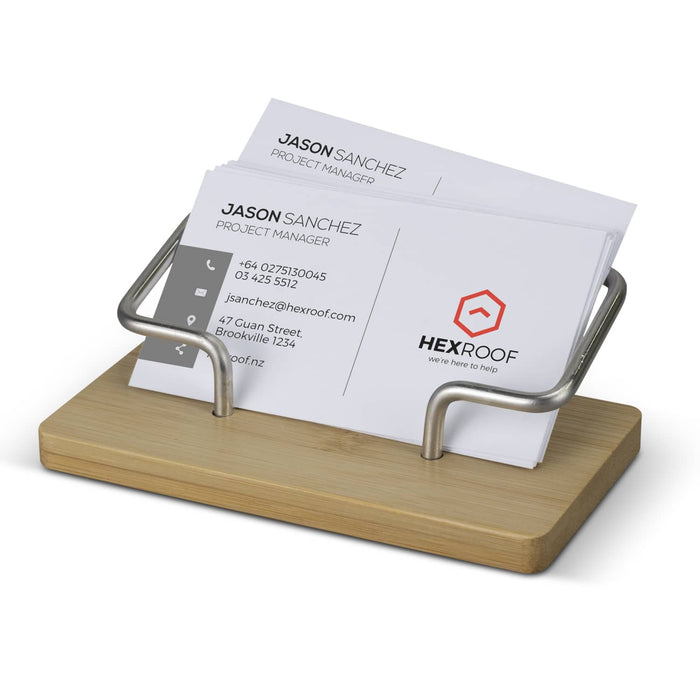 Bamboo Business Card Stand - A bamboo business card stand with a silver metal holder, displaying several business cards in a neat arrangement.