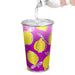Burano Colour Changing Cup - A drink cup featuring a vibrant pink and yellow lemon design, with a bottle pouring water into it.