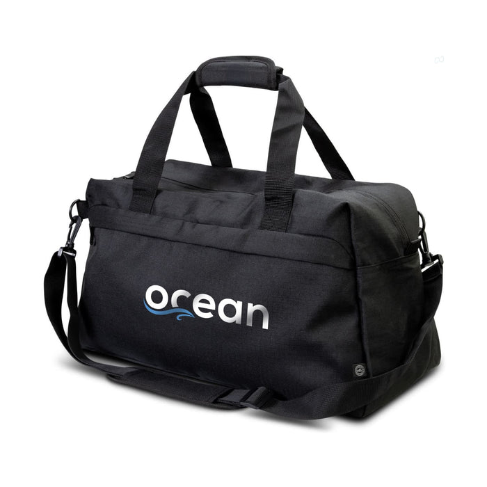 Oceana Recycled Duffle Bag - A black recycled duffle bag with handles and a removable shoulder strap. It features a logo on the side.
