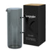 Keepsake Arlo Carafe - A drink bottle in a smoky grey colour, presented alongside a black box with branding.
