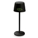Ember Rechargeable Table Lamp - A black rechargeable table lamp with a round base and a cylindrical shade featuring a logo.