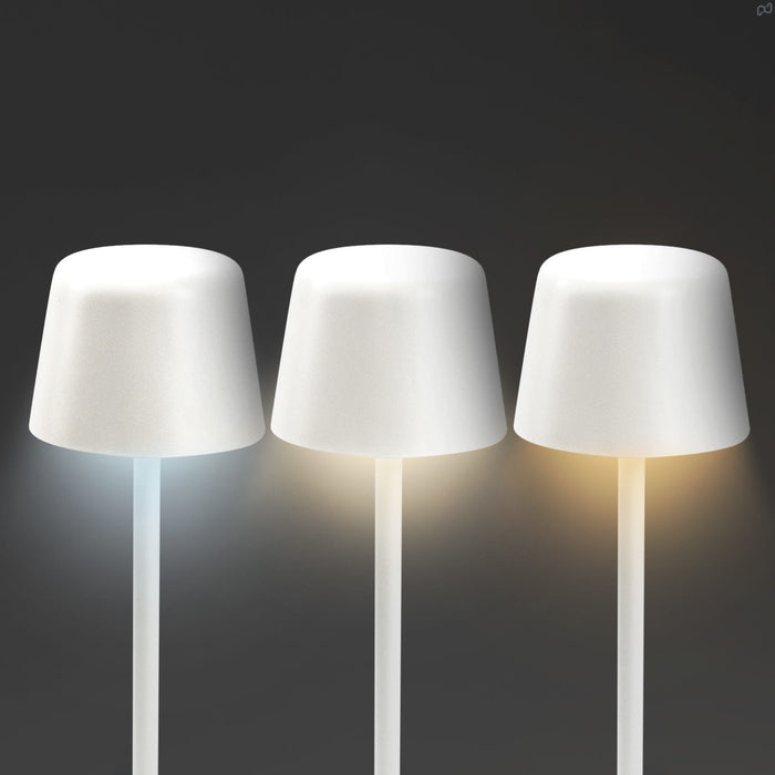 Ember Rechargeable Table Lamp - A set of three white rechargeable table lamps with varying light tones on slender transparent bases.