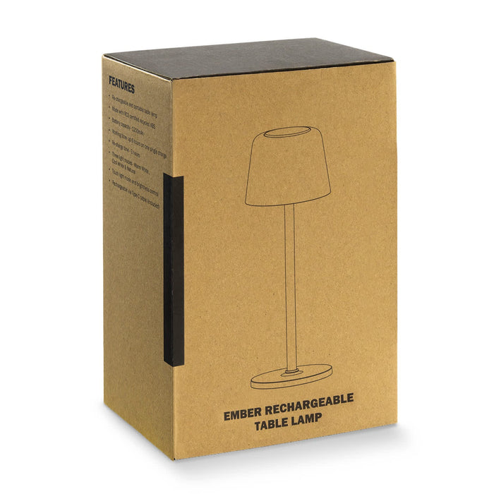 Ember Rechargeable Table Lamp - A cardboard box containing an Ember Rechargeable Table Lamp, featuring a simple design and a printed outline of the lamp.