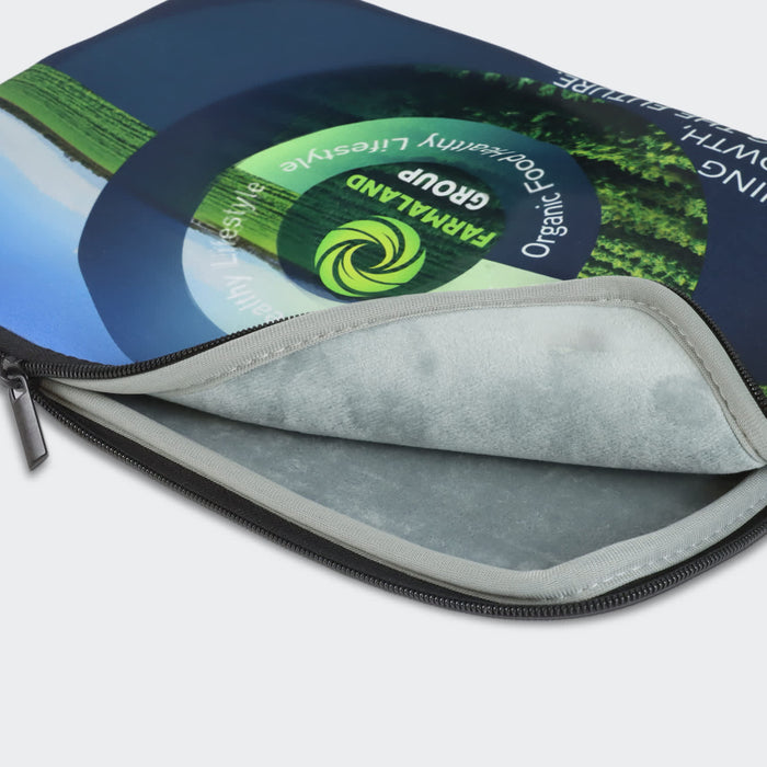 Full Colour Laptop Sleeve - Small - A small, full-colour laptop sleeve featuring a vibrant design and a soft interior lining, with a logo present.