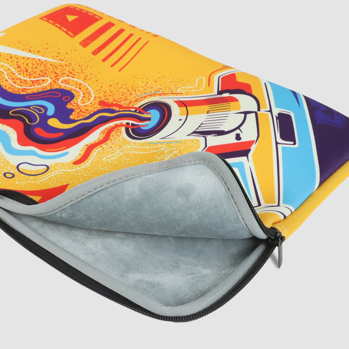 Full Colour Laptop Sleeve - Medium - A medium laptop sleeve featuring vibrant artwork in yellow, blue, and orange with a logo on the surface.