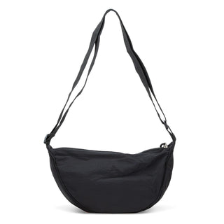 Selene Moon Bag - A black shoulder bag with a curved shape and two adjustable straps, featuring a logo on the front.