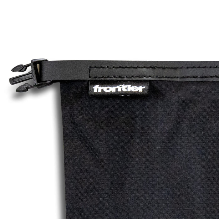 Frontier Rapid Dry Towel - A black cooling towel with a zippered closure and a branding tag.