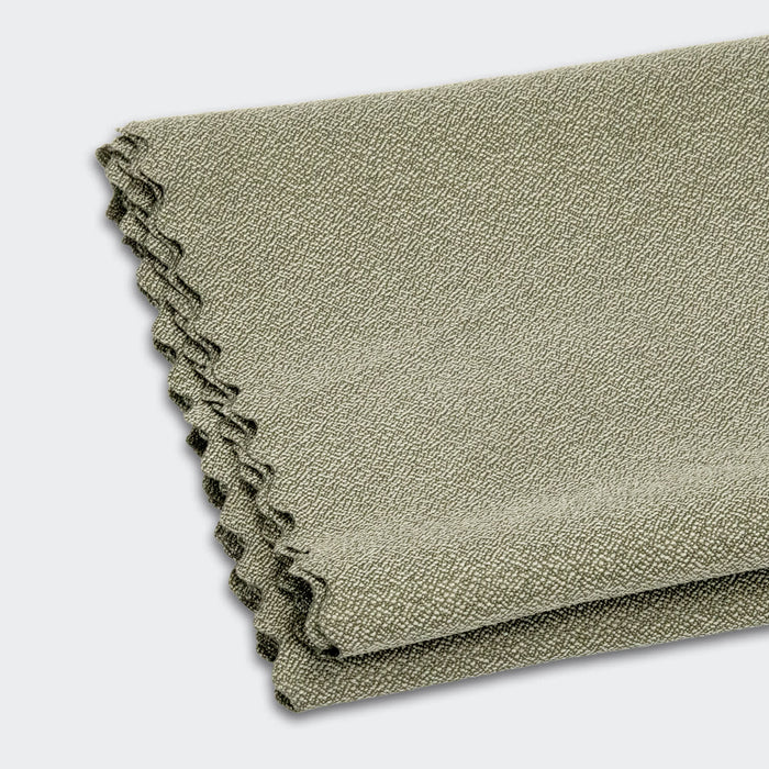 Frontier Rapid Dry Towel - A folded grey cooling towel featuring a textured fabric, suitable for outdoor activities. The towel has a branded logo.