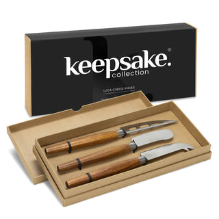 Keepsake Luca Cheese Knives - A set of three cheese knives with wooden handles in a gift box, featuring a black branding logo.