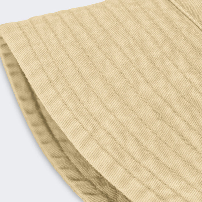 Bondi Washed Bucket Hat - A beige bucket hat with a textured fabric and a wide brim, featuring a logo on the side.