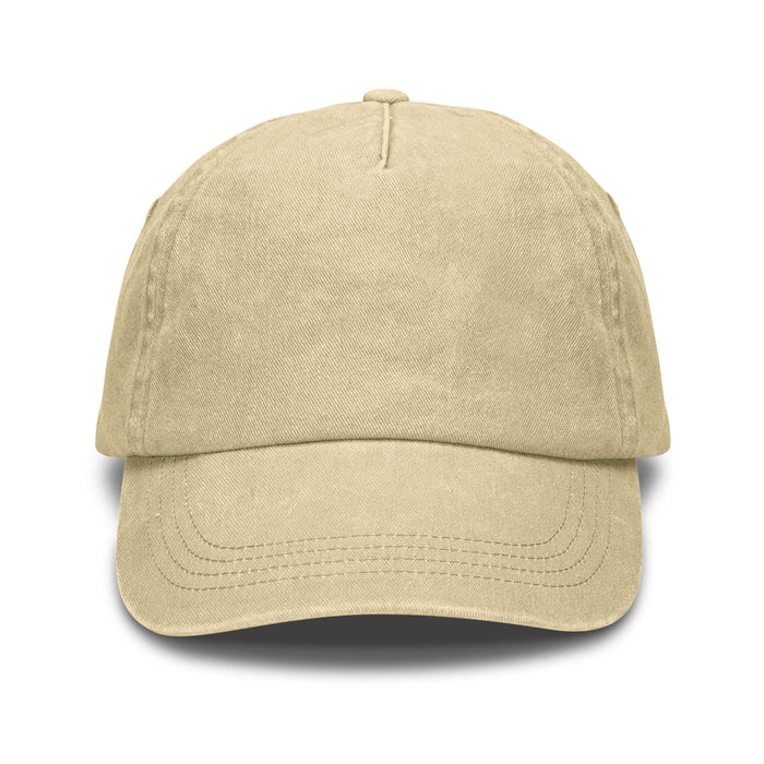 Vintage Washed Cap - A vintage washed cap in a light beige colour with a curved brim and a logo.