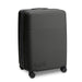 Kadi Check-In Suitcase - Medium - A medium suitcase in black with a textured surface and four wheels, featuring a logo.