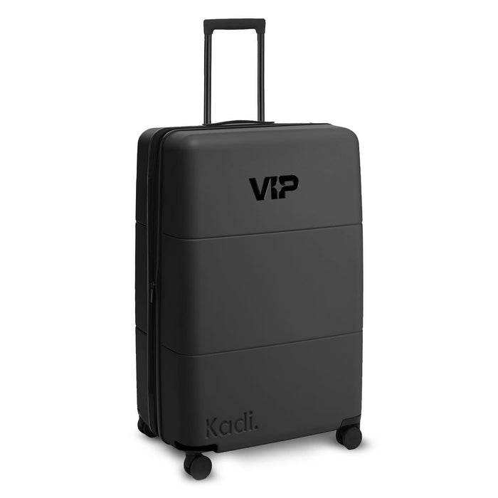 Kadi Check-In Suitcase - Large - A large black suitcase with a retractable handle and wheels, featuring a logo on the front.