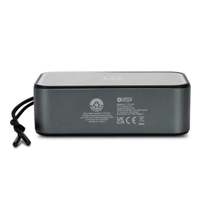 Swiss Peak 10W Bass Speaker - A grey Bluetooth speaker with a mesh top and a side strap, featuring branding and various technical labels on the back.