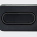 Swiss Peak 10W Bass Speaker - A rectangular black bass speaker featuring a smooth surface and a central oval design element.
