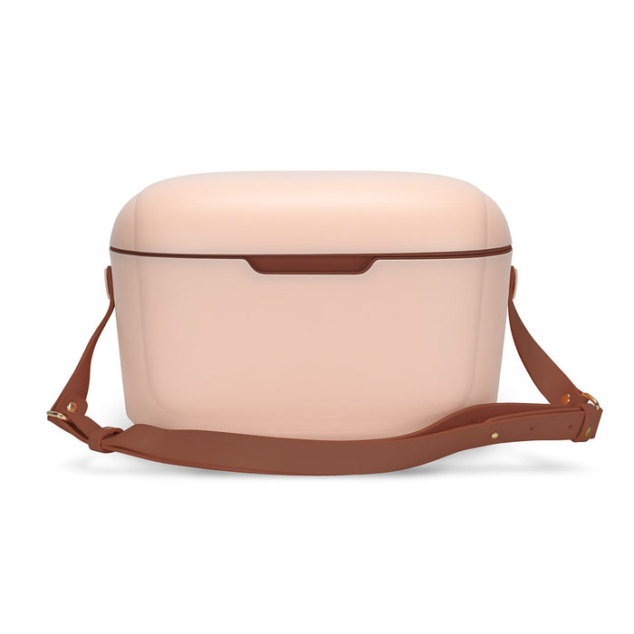 Daisy Cooler - A drink cooler in a soft pink colour with a brown strap, featuring a smooth, rounded design.
