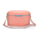 Daisy Cooler - A drink cooler in soft pink with a contrasting blue latch and a detachable light pink strap.